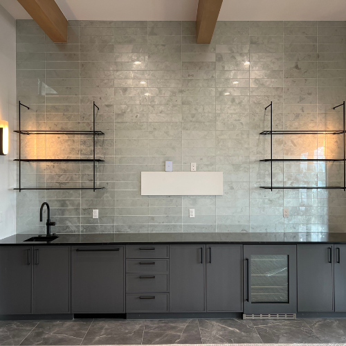 showroom long kitchen counter, sink, and shelves
